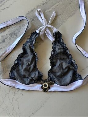 Beach Bunny Black Lace Halter Bralette with White Trim and Decorative Accent